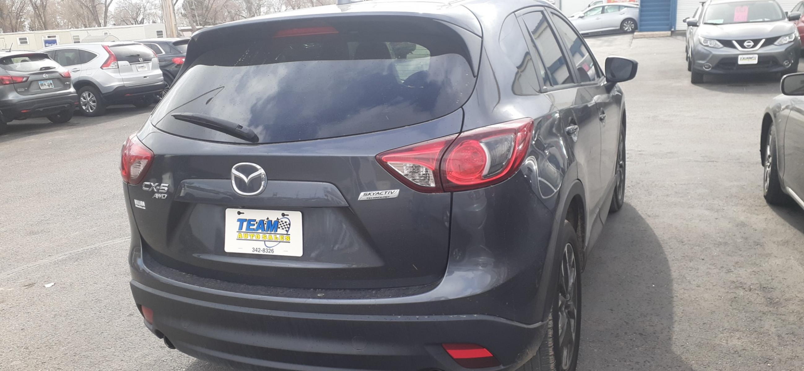 2016 Mazda CX-5 (JM3KE4DY5G0) , located at 2015 Cambell Street, Rapid City, SD, 57701, (605) 342-8326, 44.066433, -103.191772 - CARFAX AVAILABLE - Photo #4